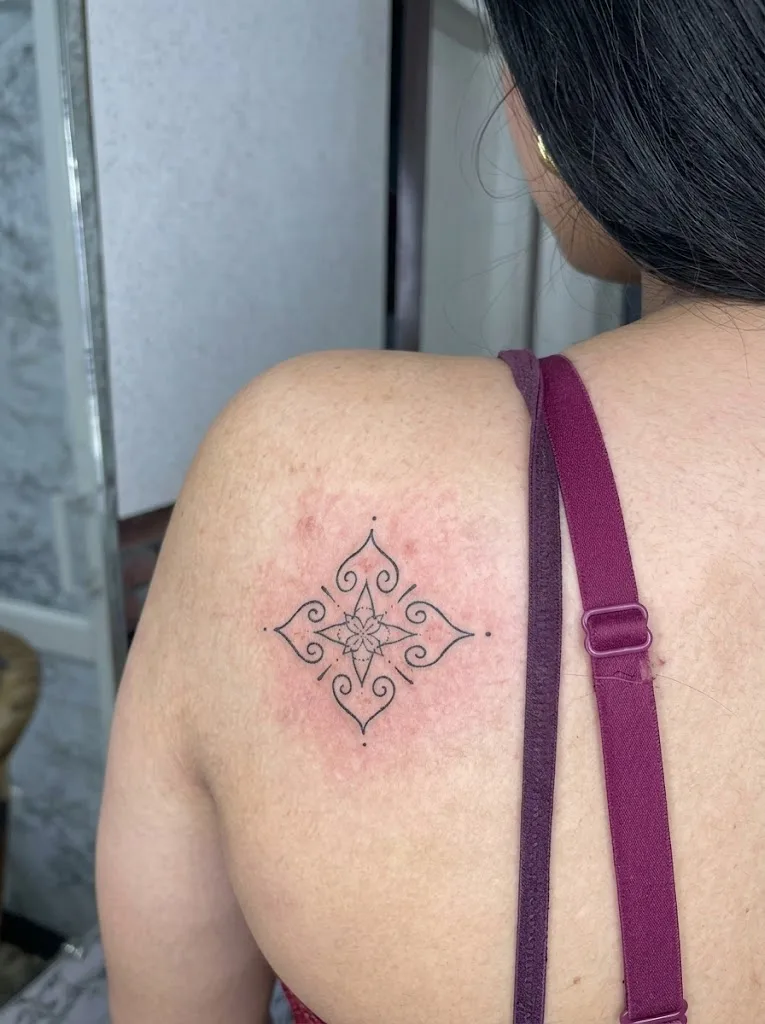 Black and Grey Realism Shoulder Tattoo